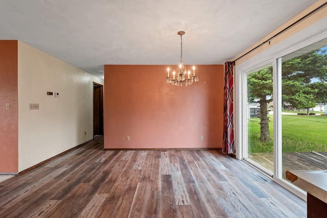 1517 Navarino St, Algoma, WI 54201 - unfurnished dining area with wood finished floors and a chandelier