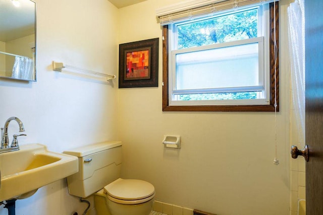 9600 W Debbie Ln, Milwaukee, WI 53224 - bathroom featuring toilet and a shower with curtain