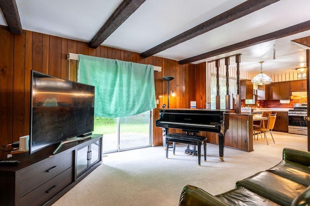 9600 W Debbie Ln, Milwaukee, WI 53224 - living area with light colored carpet, beamed ceiling, wooden walls, and a chandelier