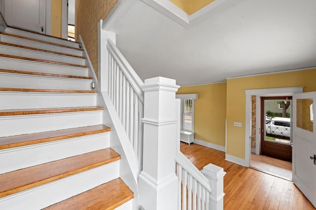 701 N 7th St, Manitowoc, WI 54220 - stairs with wood finished floors and baseboards