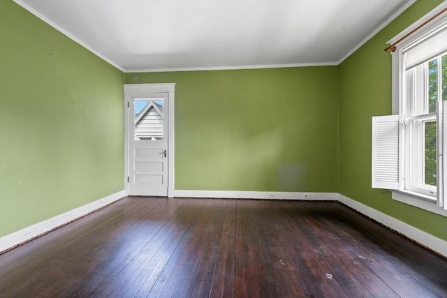 701 N 7th St, Manitowoc, WI 54220 - unfurnished room featuring healthy amount of natural light, hardwood / wood-style flooring, and ornamental molding