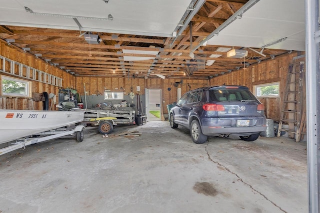 615 Ogden St, Marinette, WI 54143 - garage featuring a garage door opener