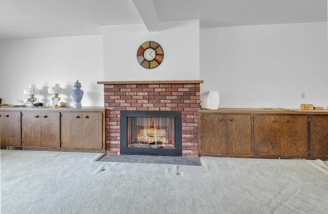615 Ogden St, Marinette, WI 54143 - unfurnished living room featuring carpet and a fireplace