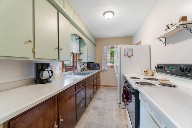 214 E Dell St, New Auburn, WI 54757 - kitchen featuring electric range oven and light countertops