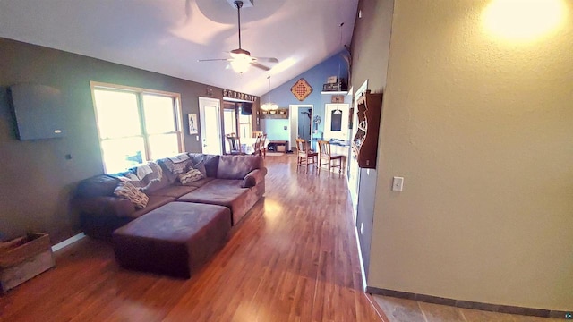 70355 Laine Rd, Iron River, WI 54847 - living room with a ceiling fan, wood finished floors, and lofted ceiling