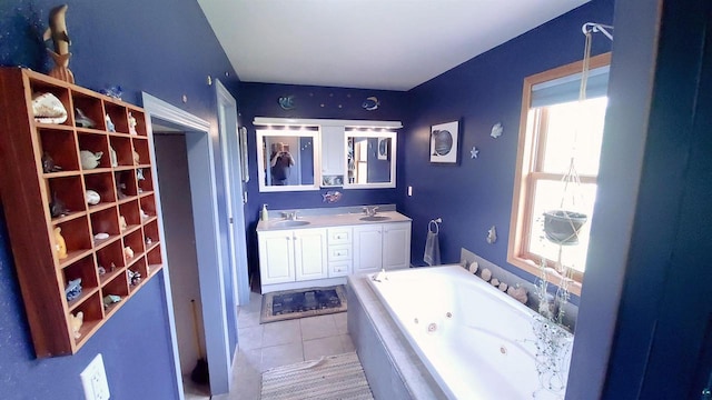 70355 Laine Rd, Iron River, WI 54847 - full bath with double vanity, a jetted tub, and tile patterned flooring