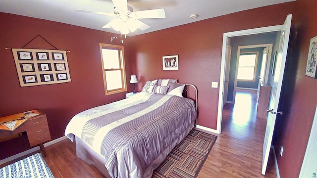 70355 Laine Rd, Iron River, WI 54847 - bedroom with wood finished floors and a ceiling fan