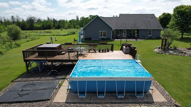 70355 Laine Rd, Iron River, WI 54847 - view of swimming pool featuring a yard, a patio, and a covered pool