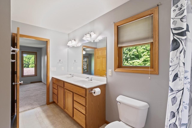 1601 Raspberry Ln, Mount Horeb, WI 53572 - full bathroom with double vanity and toilet