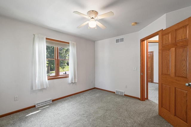 1601 Raspberry Ln, Mount Horeb, WI 53572 - carpeted empty room with ceiling fan and a smoke detector