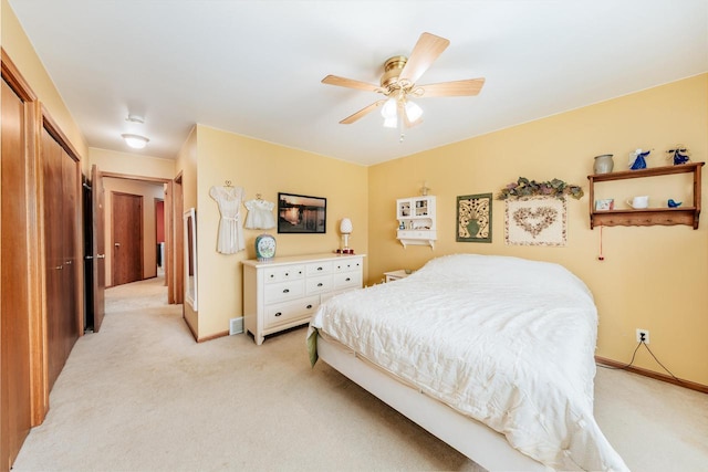 143 Parkview Ct, Cedar Grove, WI 53013 - bedroom with light colored carpet and ceiling fan