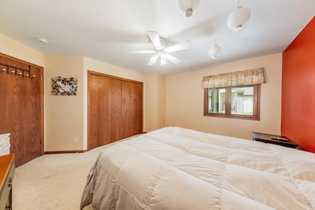 143 Parkview Ct, Cedar Grove, WI 53013 - bedroom with carpet, a closet, and a ceiling fan
