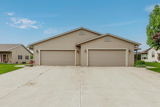 143 Parkview Ct, Cedar Grove, WI 53013 - view of front of house featuring driveway and an attached garage