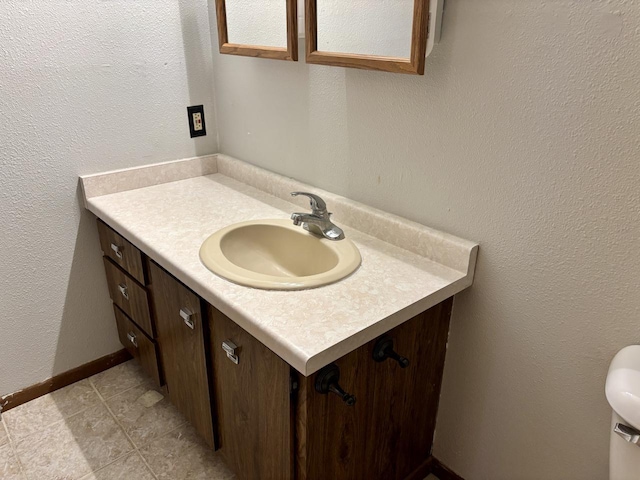 1712 Creek Rd Unit 202, West Bend, WI 53090 - bathroom featuring vanity and toilet