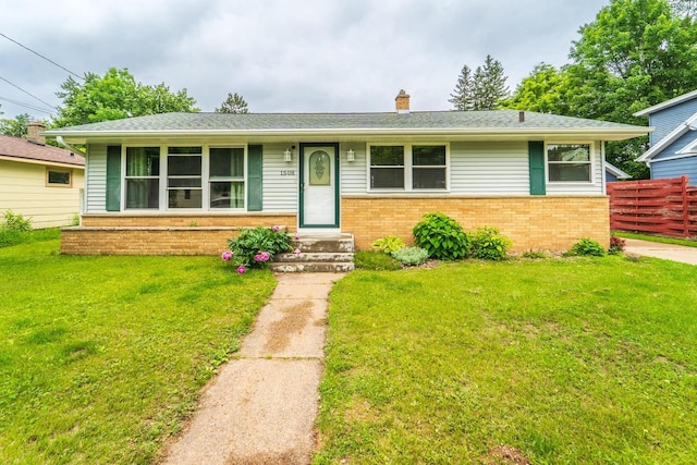 1508 Pearson St, Wausau, WI 54401 - view of front of house featuring brick siding, a chimney, and entry steps