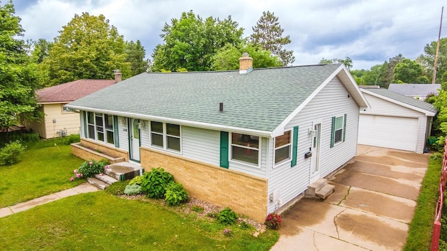 1508 Pearson St, Wausau, WI 54401 - view of front facade featuring entry steps, brick siding, a front lawn, and a chimney