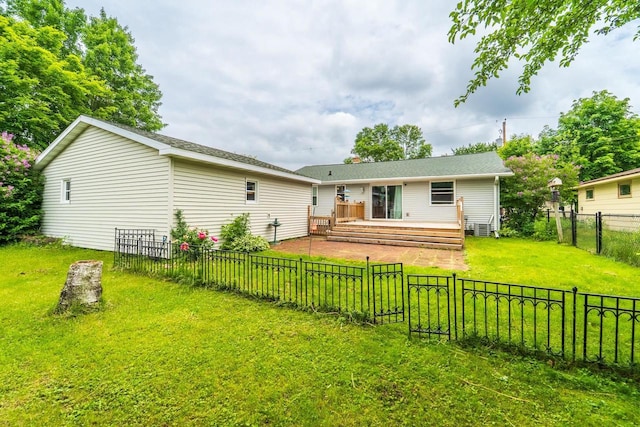 1508 Pearson St, Wausau, WI 54401 - back of house featuring a wooden deck and a fenced backyard