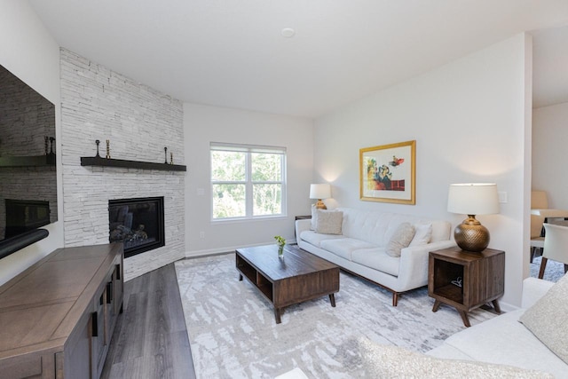 310 Paradise Ct, Hartland, WI 53029 - living area featuring a fireplace and wood finished floors