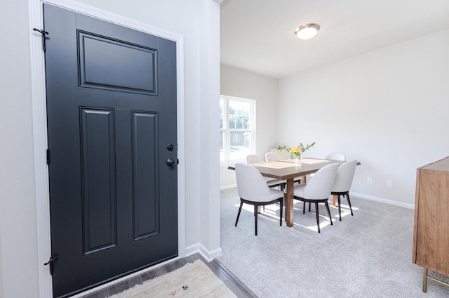 310 Paradise Ct, Hartland, WI 53029 - dining room with baseboards and carpet