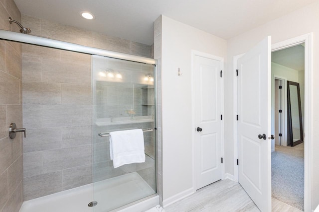 310 Paradise Ct, Hartland, WI 53029 - full bathroom with a stall shower and recessed lighting