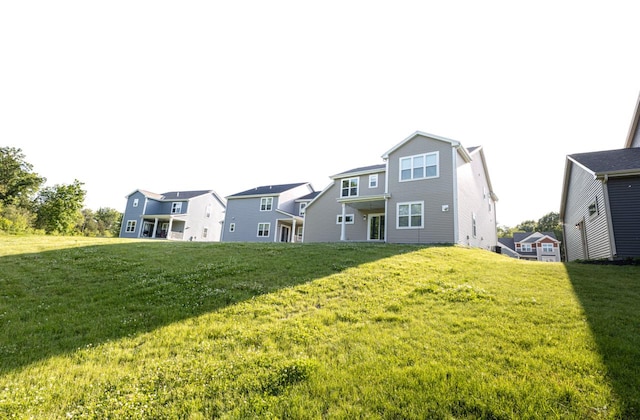 310 Paradise Ct, Hartland, WI 53029 - back of house with a yard