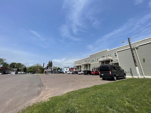 126 W Bayfield St, Washburn, WI 54891 - view of asphalt street with a residential view and traffic signs