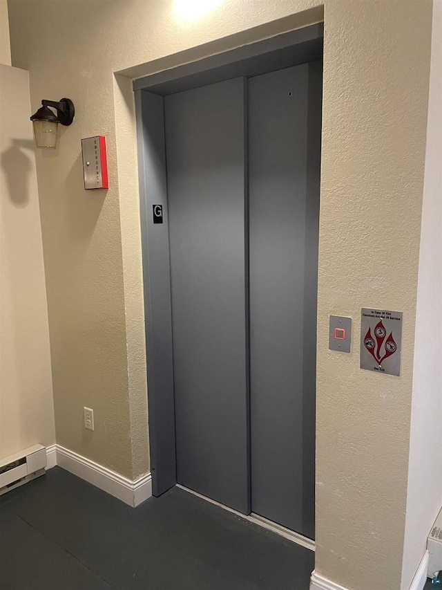 126 W Bayfield St, Washburn, WI 54891 - entrance to property with elevator and baseboard heating