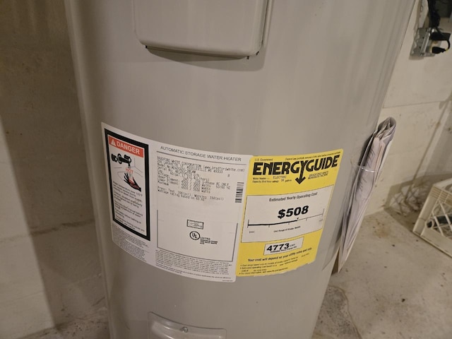 131 Crestview Ln, Nekoosa, WI 54457 - detailed view of water heater and unfinished concrete floors