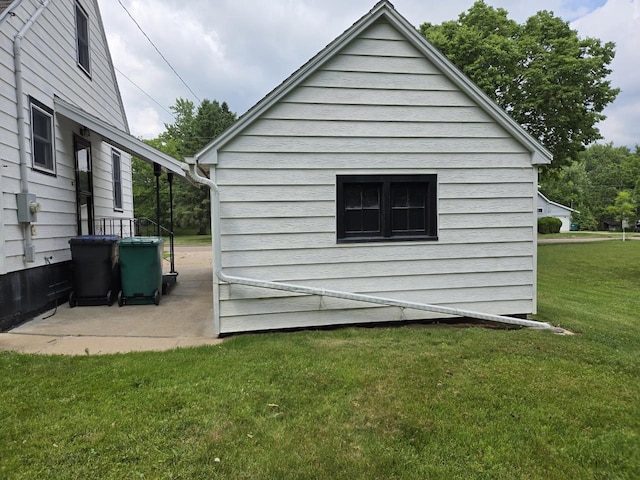 131 Crestview Ln, Nekoosa, WI 54457 - back of house featuring a lawn