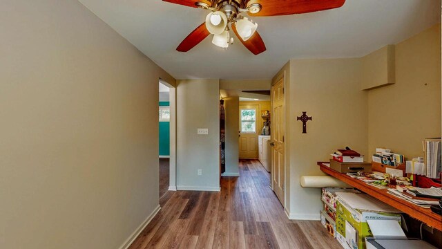 N2493 Kunz Rd, Fort Atkinson, WI 53538 - corridor with wood finished floors and baseboards