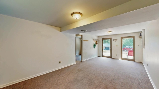 N2493 Kunz Rd, Fort Atkinson, WI 53538 - empty room featuring baseboards and carpet