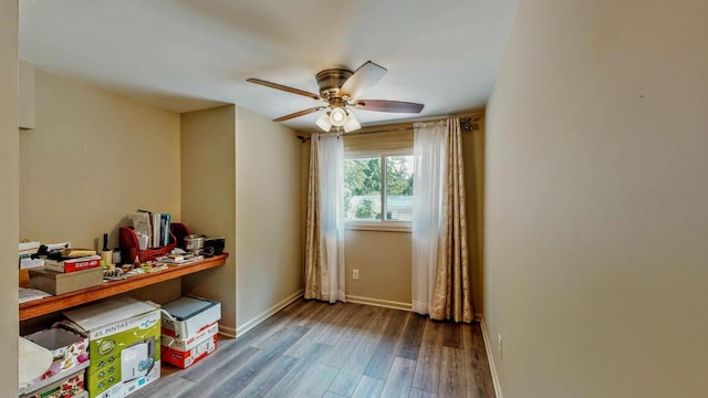 N2493 Kunz Rd, Fort Atkinson, WI 53538 - empty room with ceiling fan and wood finished floors