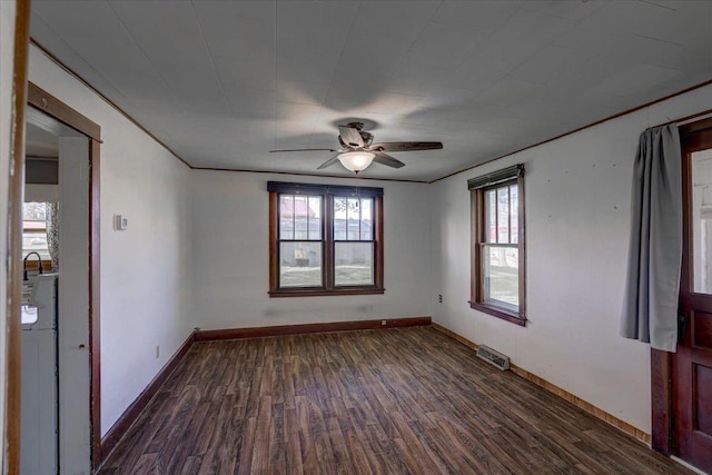 500 2nd Ave, Hollandale, WI 53544 - empty room featuring dark wood-style flooring and a ceiling fan
