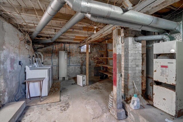 500 2nd Ave, Hollandale, WI 53544 - unfinished below grade area with water heater, washer and dryer, and heating unit