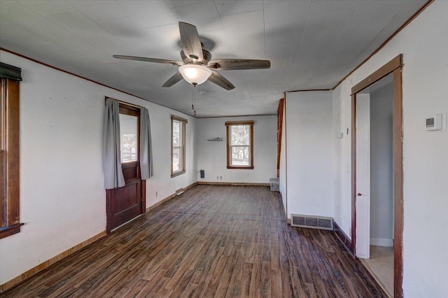 500 2nd Ave, Hollandale, WI 53544 - spare room with ceiling fan and dark wood-type flooring