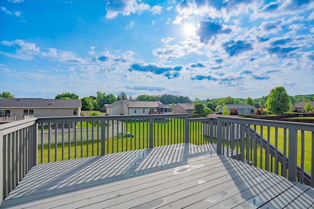 862 Stonefield Dr, Edgerton, WI 53534 - wooden deck featuring a residential view and a lawn