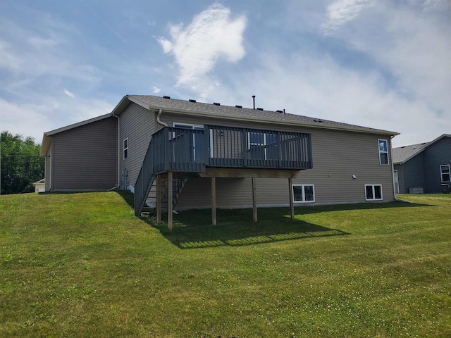 862 Stonefield Dr, Edgerton, WI 53534 - back of property featuring a wooden deck, stairway, and a yard