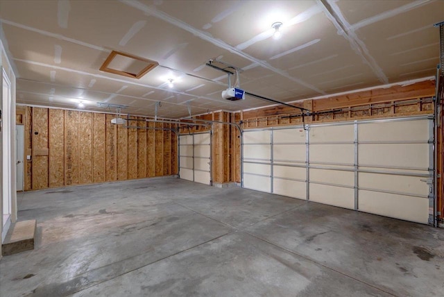 862 Stonefield Dr, Edgerton, WI 53534 - garage featuring a garage door opener