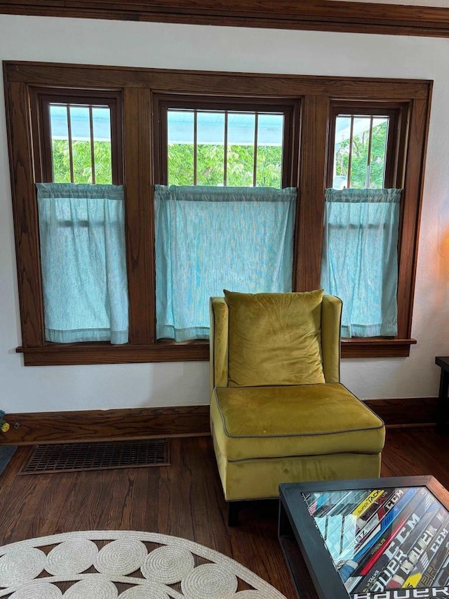 168 14th St, Fond Du Lac, WI 54935 - sitting room with wood finished floors and baseboards