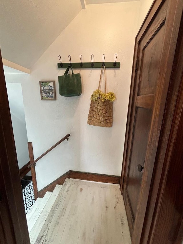 168 14th St, Fond Du Lac, WI 54935 - mudroom featuring vaulted ceiling and wood finished floors