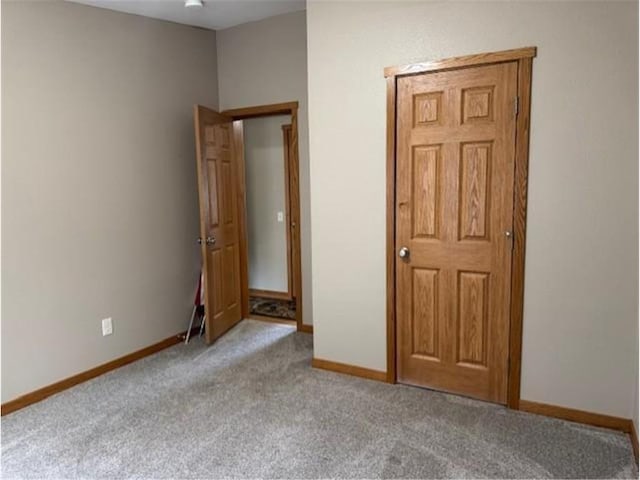 2779 250th Ave, Saint Croix Falls, WI 54024 - unfurnished bedroom with carpet flooring and baseboards