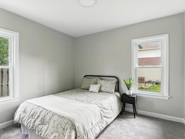 821 N 6th St, Manitowoc, WI 54220 - carpeted bedroom with multiple windows