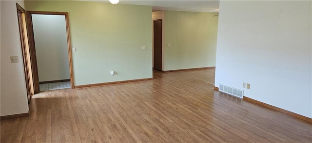 2931 148th Ave, Bloomer, WI 54724 - empty room featuring wood finished floors and baseboards