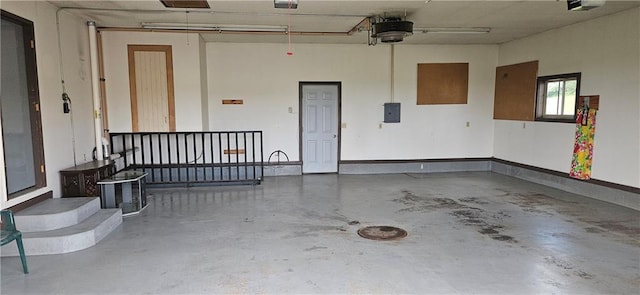 2931 148th Ave, Bloomer, WI 54724 - garage with electric panel and a garage door opener