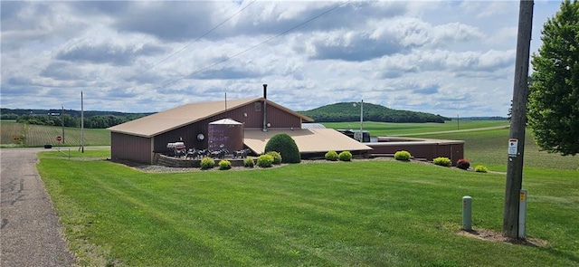 2931 148th Ave, Bloomer, WI 54724 - view of front of home with a front lawn and a mountain view
