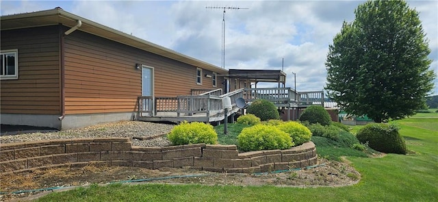 2931 148th Ave, Bloomer, WI 54724 - view of side of property with a wooden deck and a lawn