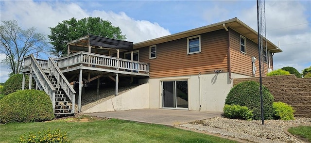 2931 148th Ave, Bloomer, WI 54724 - rear view of property with a wooden deck, stairway, and a patio