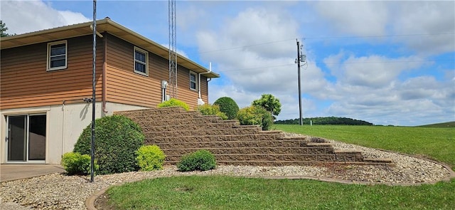 2931 148th Ave, Bloomer, WI 54724 - view of property exterior with stairway and a yard