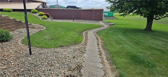 2931 148th Ave, Bloomer, WI 54724 - view of grassy yard featuring a pole building and an outbuilding