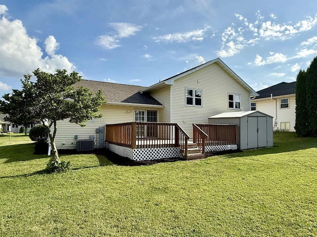 1335 Terapin Trl, Janesville, WI 53545 - back of house with a storage unit, a wooden deck, a lawn, and a shingled roof